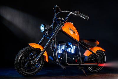 mini-motorcycle-electric-bike-with-bluetooth-speaker-and-led-lights-for-kids-cruiser-12-plus-orange-with-smoke